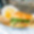 The Latham Bakery Tuna Salad is a mix of lemon, capers, dill and olive oil served on your choice of bread with arugula and tomato.