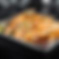 A 14 inch four tortilla quesadilla loaded with 12 pieces of grilled shrimp, pico de gallo, cilantro, corn tortilla strips, and our signature Baja Sauce.