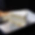 A slice of homemade tres leches cake infused with vanilla.