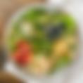 The CHICKEN FRUIT SALAD includes strawberries, blueberries, almonds, blue cheese, and seasoned chicken served on fresh baby spinach and topped with poppyseed dressing.  