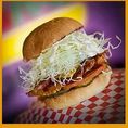 Pork katsu, bacon, cheddar cheese, cabbage, tomato, pickles, onion, Japanese mayo & tonkatsu sauce.