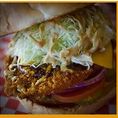 Japanese Curry Powdered Natural Pork Loin Katsu, American Cheese, Tonkatsu Sauce, & Curry Mayo.