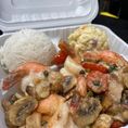 Shrimp sautéed in garlic butter & topped with fresh mushrooms, tomatoes and capers