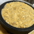 Street Corn Dip  Roasted corn, jalapenos,, cheese and spices - que bueno! Served with crisp, fresh, housemade chips!